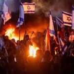 இஸ்ரேல் அமைச்சரை சுத்தி வளைத்து தாக்கிய மக்கள்