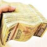 யாழில் பணத்தை எரித்த தமிழர்